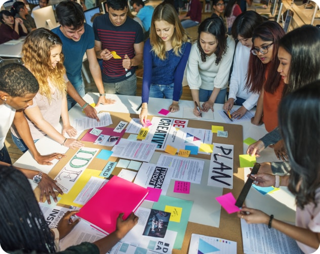 group of kids working on project in classroom