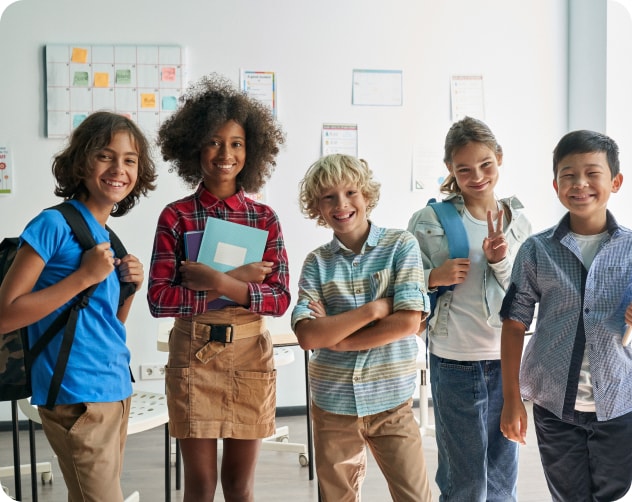 group of kids in school smiling for portrait