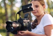 girl filming outside