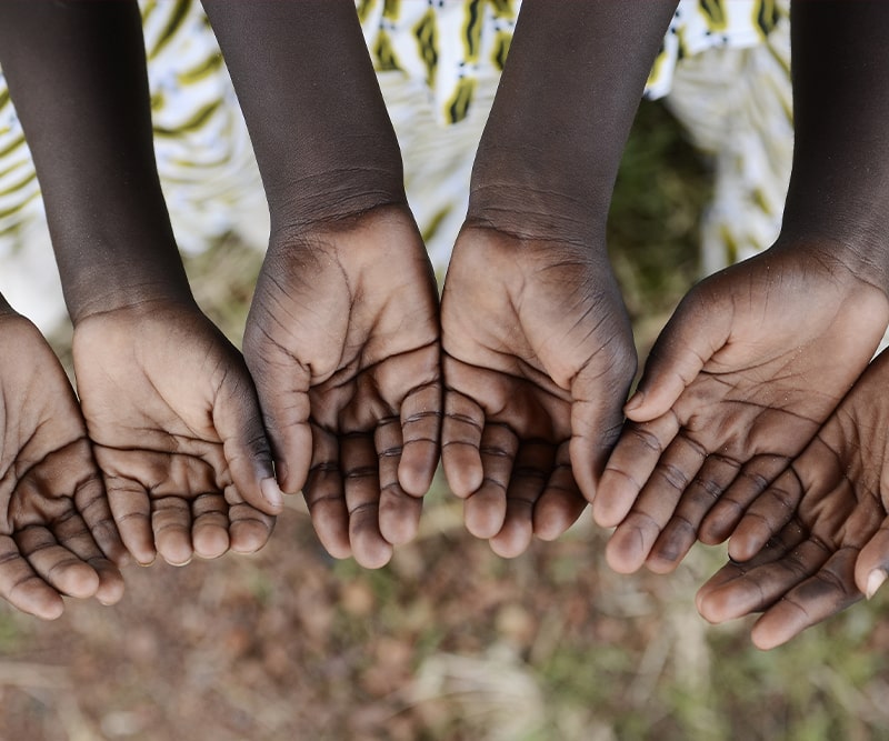closeup of hands of ethiopian girls