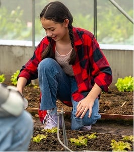 student gardening