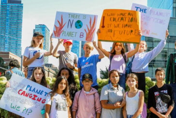 Young activists taking part in a climate change protest.
